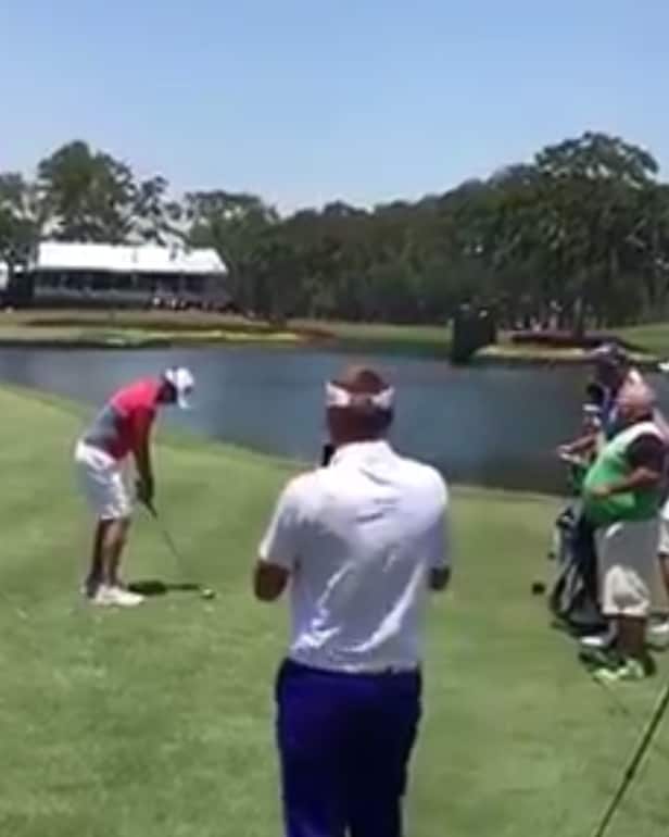 Watch Henrik Stenson's caddie throw his club into the water before The